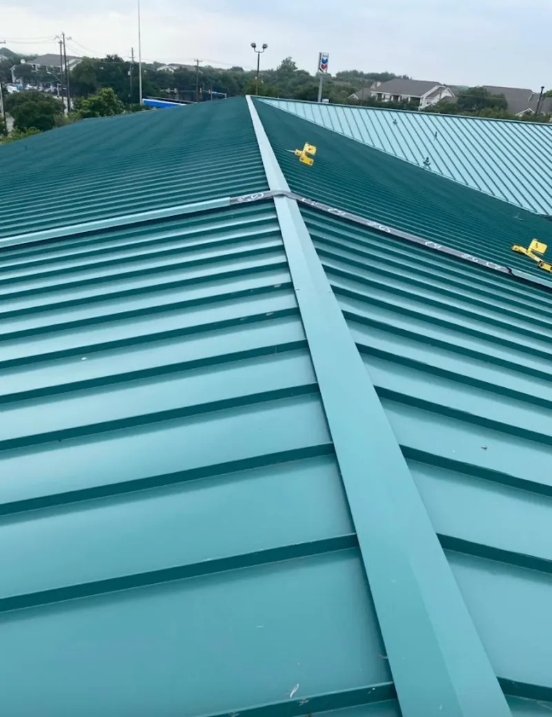 Green commercial metal roof ridge and valley for Metal Roof Repair in Snohomish